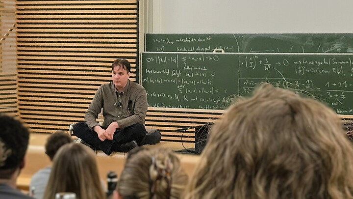 Marc Ratkovic giving a talk to students in a lecture hall