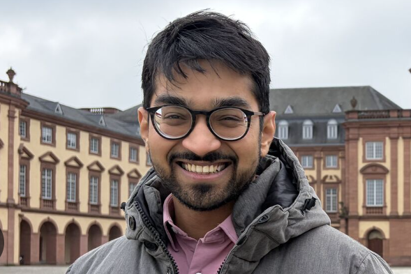 Picture of Dr. Swapneel Mehta in front of the Mannheim Palace.