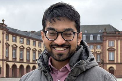 Picture of Dr. Swapneel Mehta in front of the Mannheim Palace.