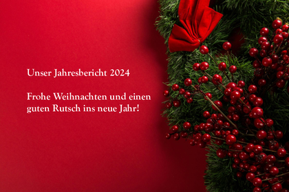 roter Hintergrund, weihnachtskranz und Text der lautet unser Jahresreport und frohe Weihnachten und einen guten Rutsch ins neue Jahr