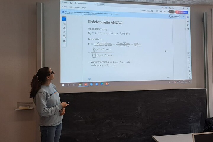 Researcher teaching a statistics seminar